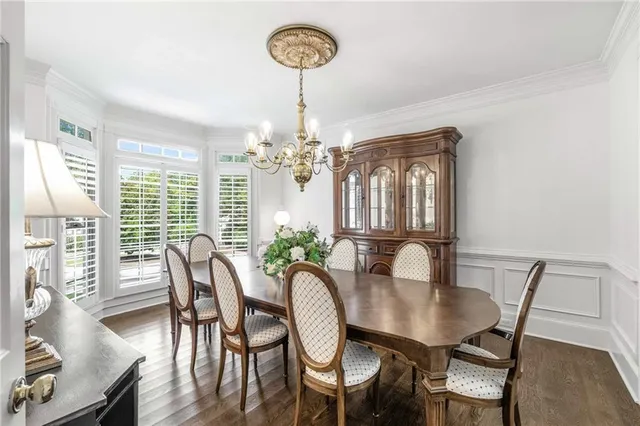 a spacious bedroom with a large bed and a window