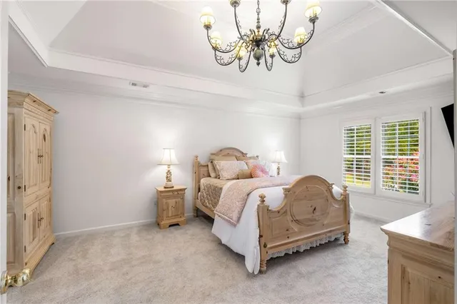 a bathroom with a double vanity sink mirror and shower
