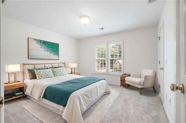 a kitchen with stainless steel appliances granite countertop a refrigerator and a stove