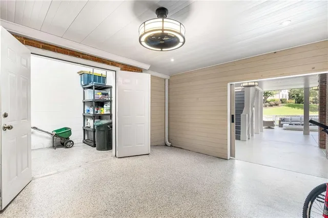an aerial view of a house with outdoor space
