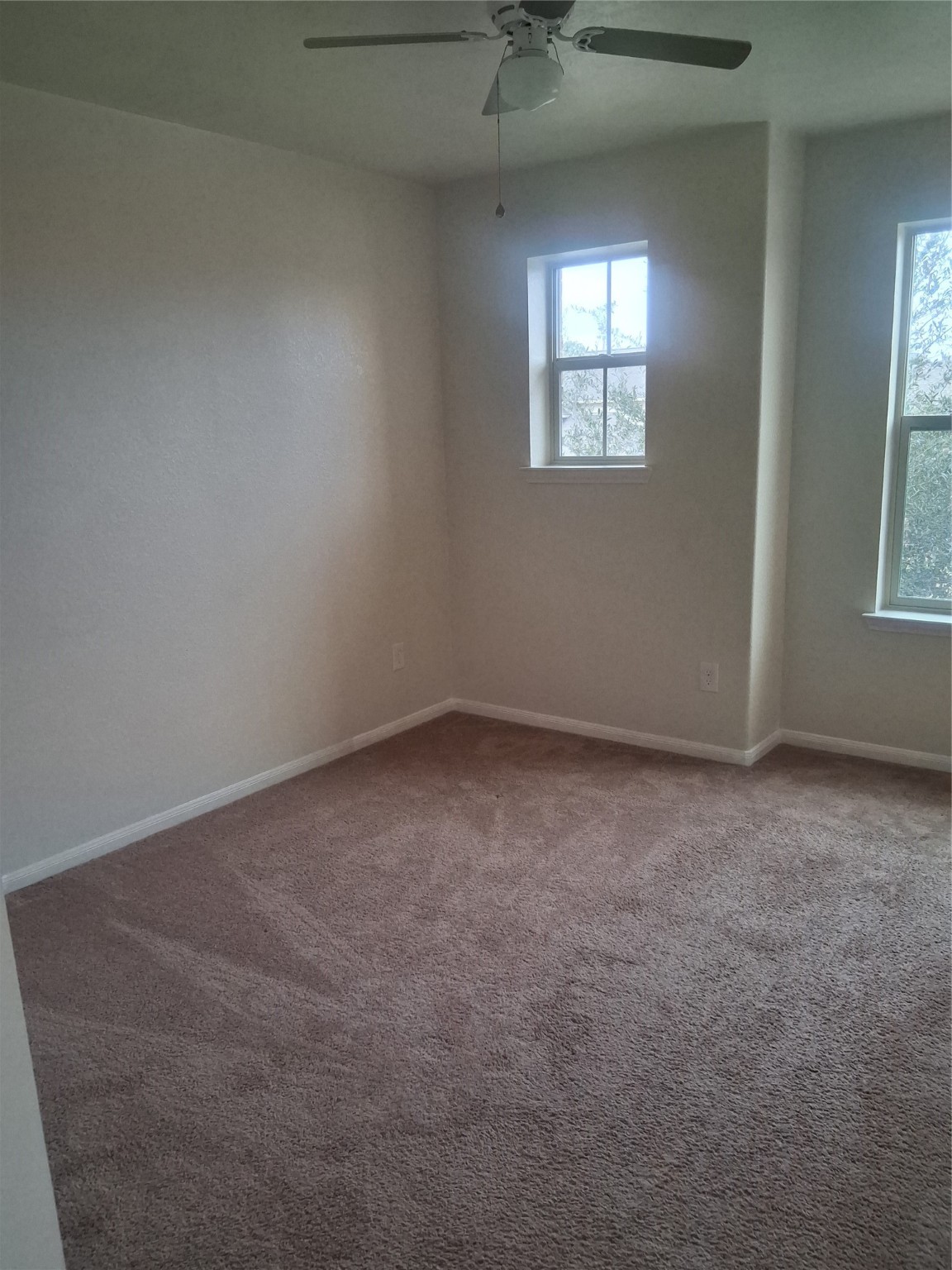 13610 Spectacled Bear Lane Crosby, TX 77532 - Photo 18 of 32 an empty room with a window