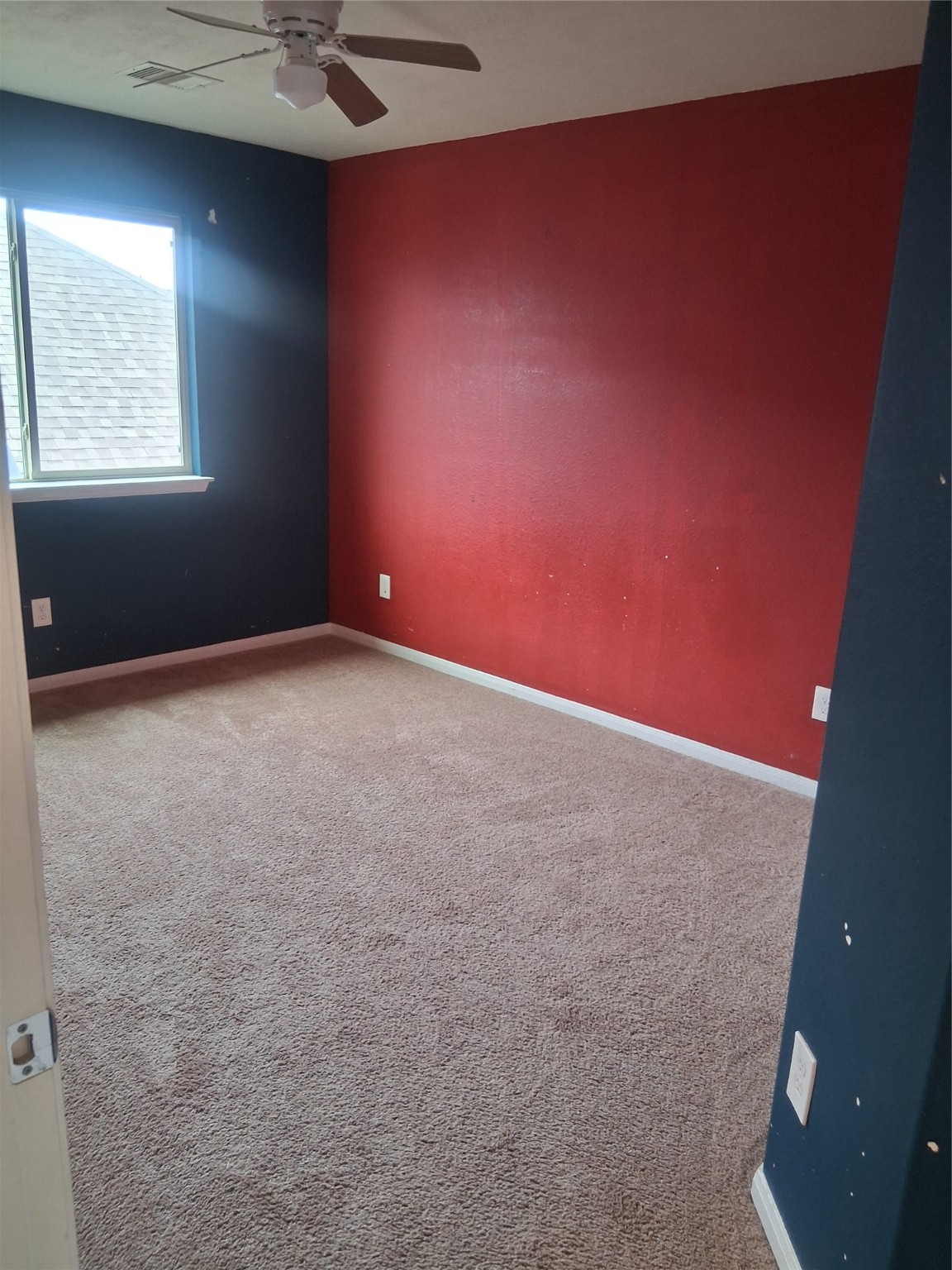 13610 Spectacled Bear Lane Crosby, TX 77532 - Photo 22 of 32 an empty room with a window