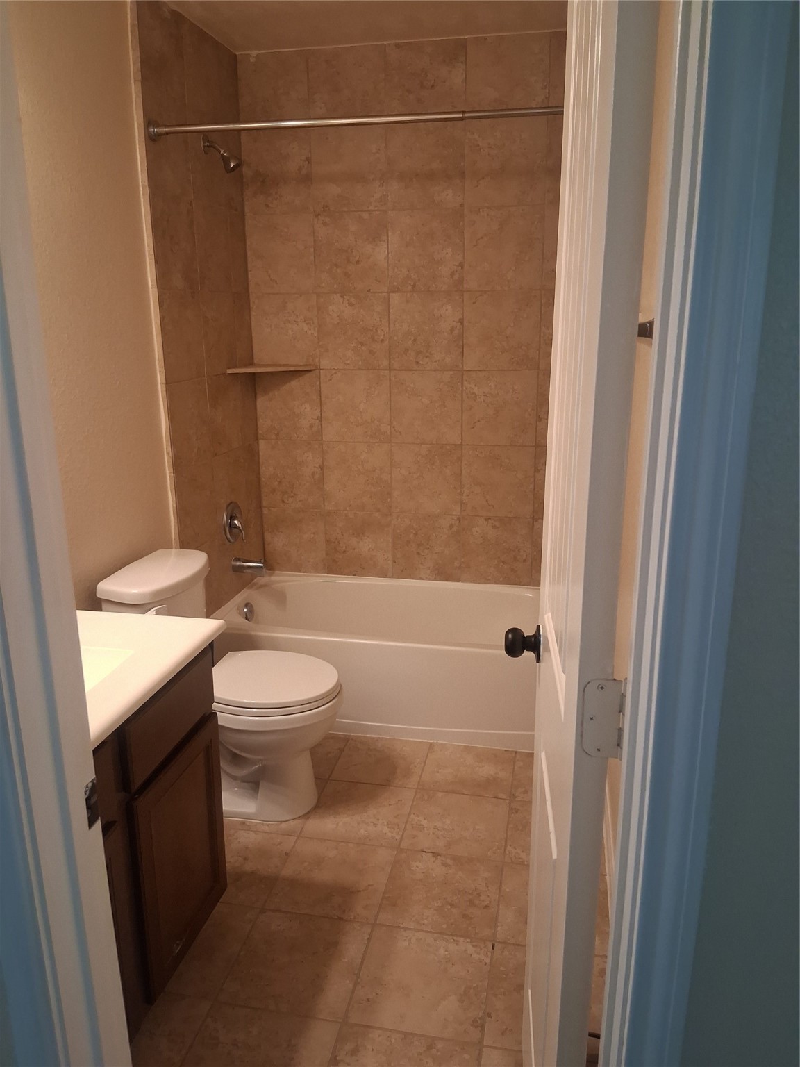 13610 Spectacled Bear Lane Crosby, TX 77532 - Photo 24 of 32 a bathroom with a granite countertop sink toilet and shower