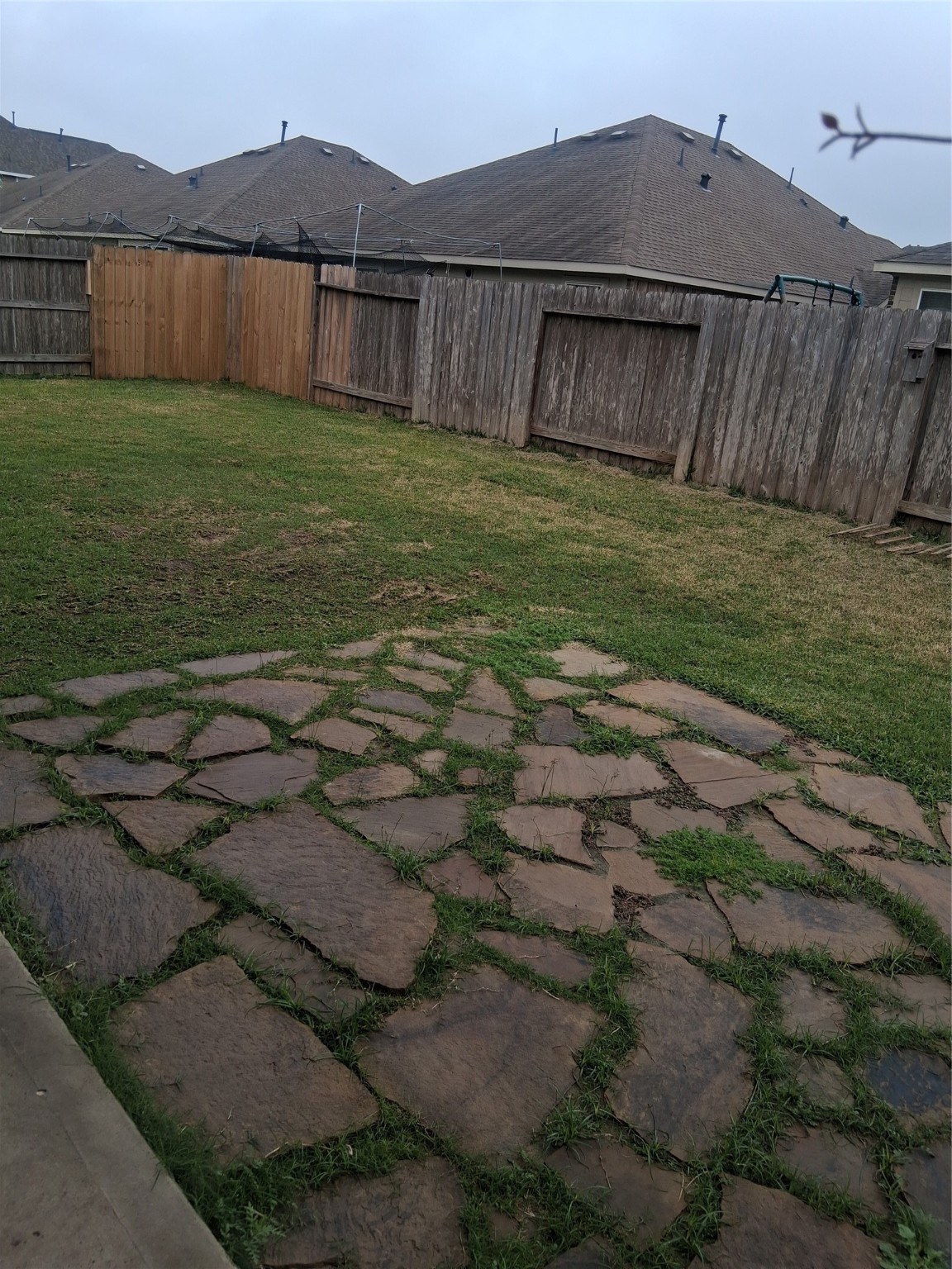 13610 Spectacled Bear Lane Crosby, TX 77532 - Photo 30 of 32 a view of a backyard with a tub