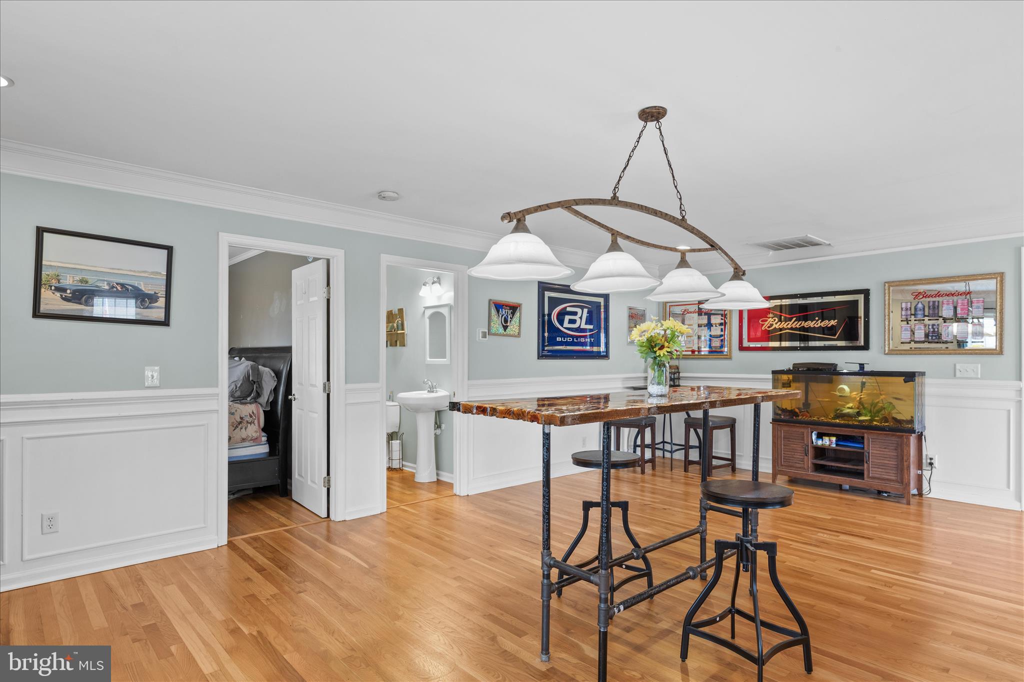 12647 Old Stage Road Bishopville, MD 21813 - Photo 45 of 84 a view of a dining room with furniture and wooden floor