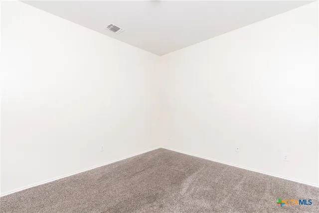a view of wooden floor in a bathroom