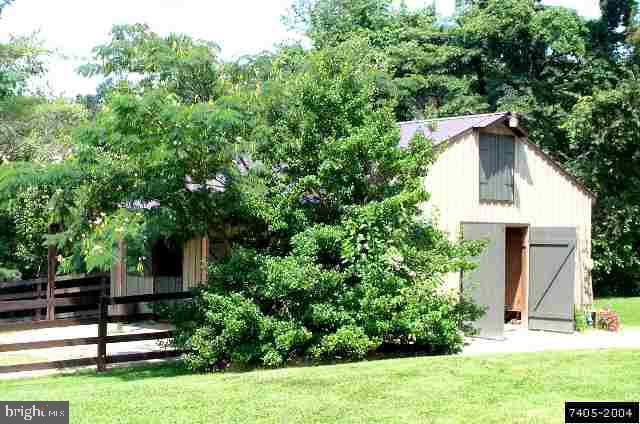 6129 Hoff Road Spring Grove, PA 17362 - Photo 2 of 4 a front view of a house with a yard