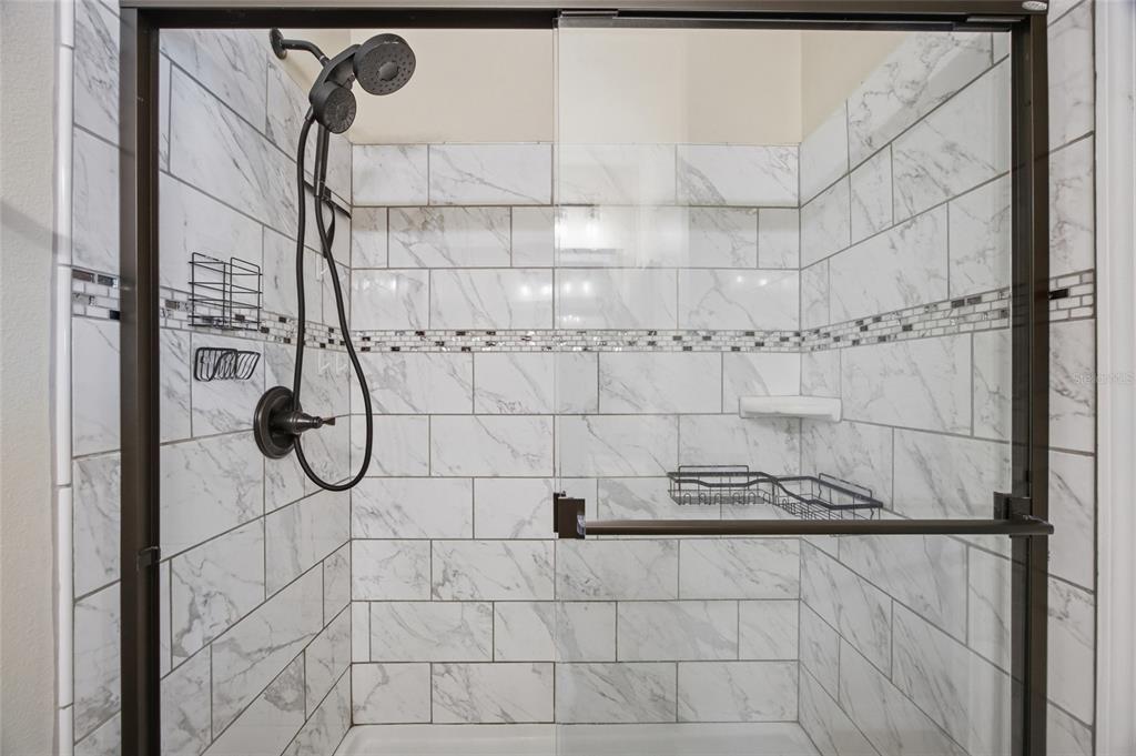 4517 Southeast 28th Street Ocala, FL 34480 - Photo 30 of 43 a bathroom with a shower