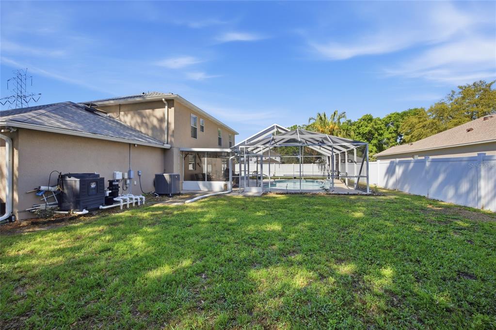 4517 Southeast 28th Street Ocala, FL 34480 - Photo 36 of 43 a view of a house with a yard and sitting area