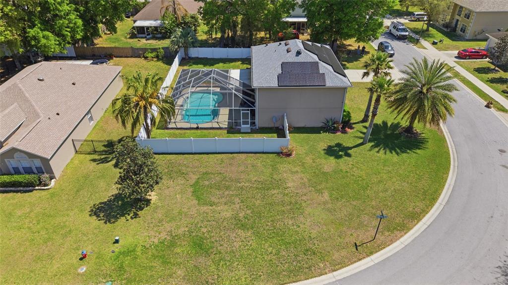 4517 Southeast 28th Street Ocala, FL 34480 - Photo 38 of 43 a view of a swimming pool with a yard