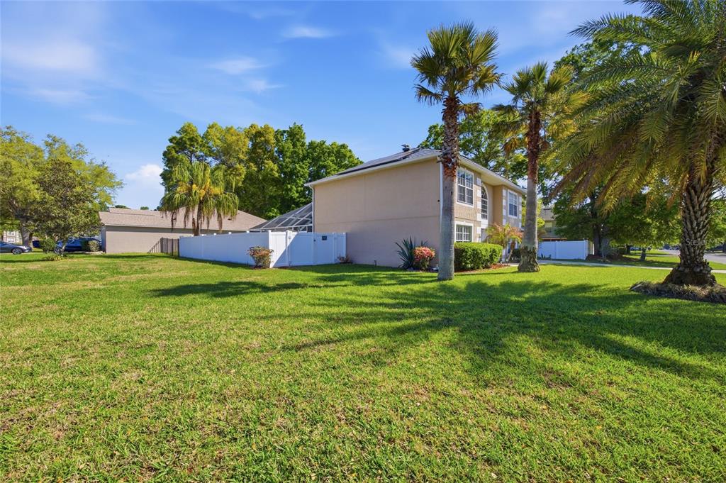 4517 Southeast 28th Street Ocala, FL 34480 - Photo 5 of 43 a front view of house with yard and trees