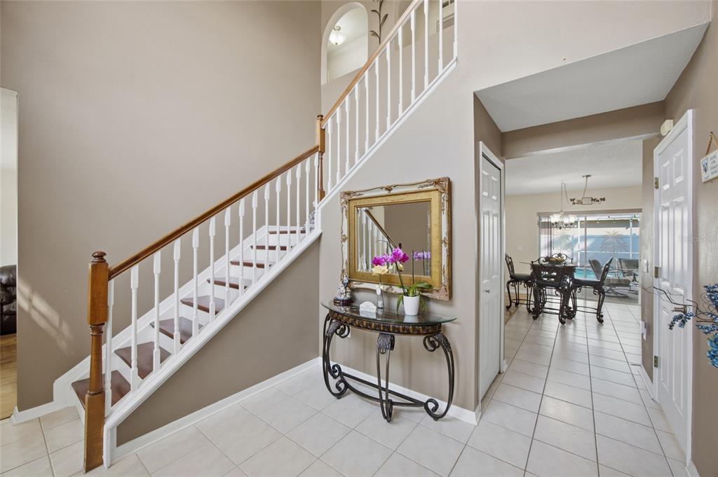 4517 Southeast 28th Street Ocala, FL 34480 - Photo 6 of 43 a dining room with furniture and entryway