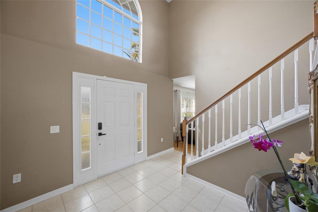 4517 Southeast 28th Street Ocala, FL 34480 - Photo 7 of 43 a view of a hallway and a livingroom with furniture