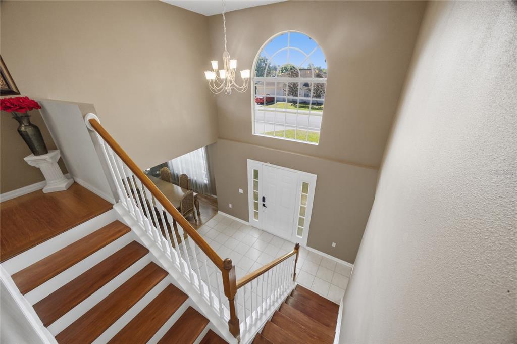 4517 Southeast 28th Street Ocala, FL 34480 - Photo 8 of 43 a view of entryway and hall with wooden floor