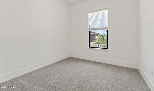a bathroom view of a toilet and a hardwood floor