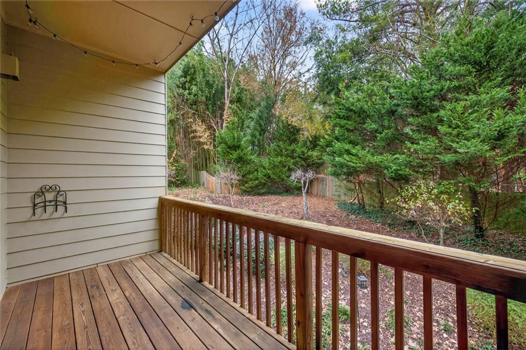 1982 Cobblestone Circle Northeast Brookhaven, GA 30319 - Photo 36 of 51 a view of a balcony with wooden floor