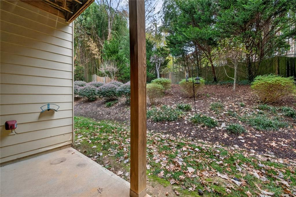 1982 Cobblestone Circle Northeast Brookhaven, GA 30319 - Photo 40 of 51 a view of a backyard with trees
