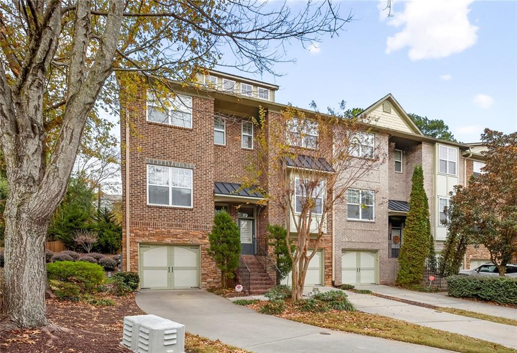 1982 Cobblestone Circle Northeast Brookhaven, GA 30319 - Photo 50 of 51 a front view of a house