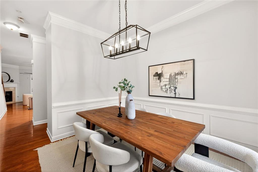 1982 Cobblestone Circle Northeast Brookhaven, GA 30319 - Photo 6 of 51 a dining room with furniture and wooden floor