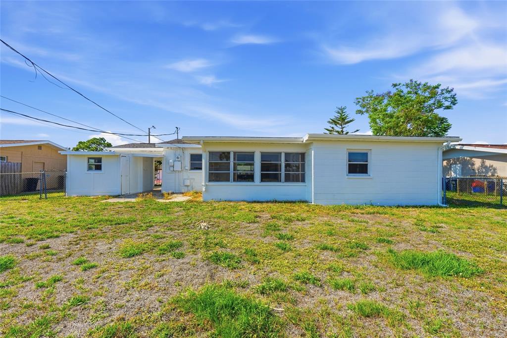 363 Glen Oak Road Venice, FL 34293 - Photo 50 of 53 a view of a house with a backyard