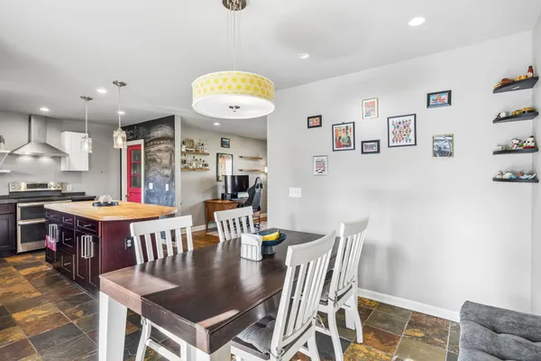 a view of a dining room with furniture