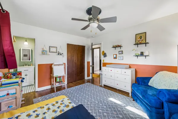 a bed room with a bed and furniture