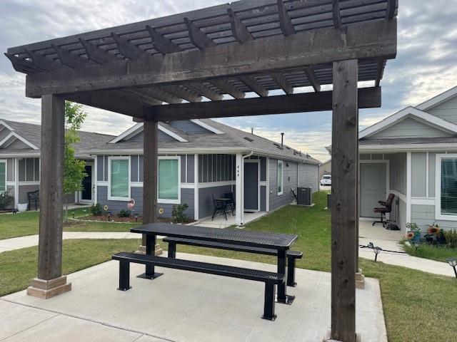 464 Reverie Way Ferris, TX 75125 - Photo 3 of 21 a backyard of a house with table and chairs