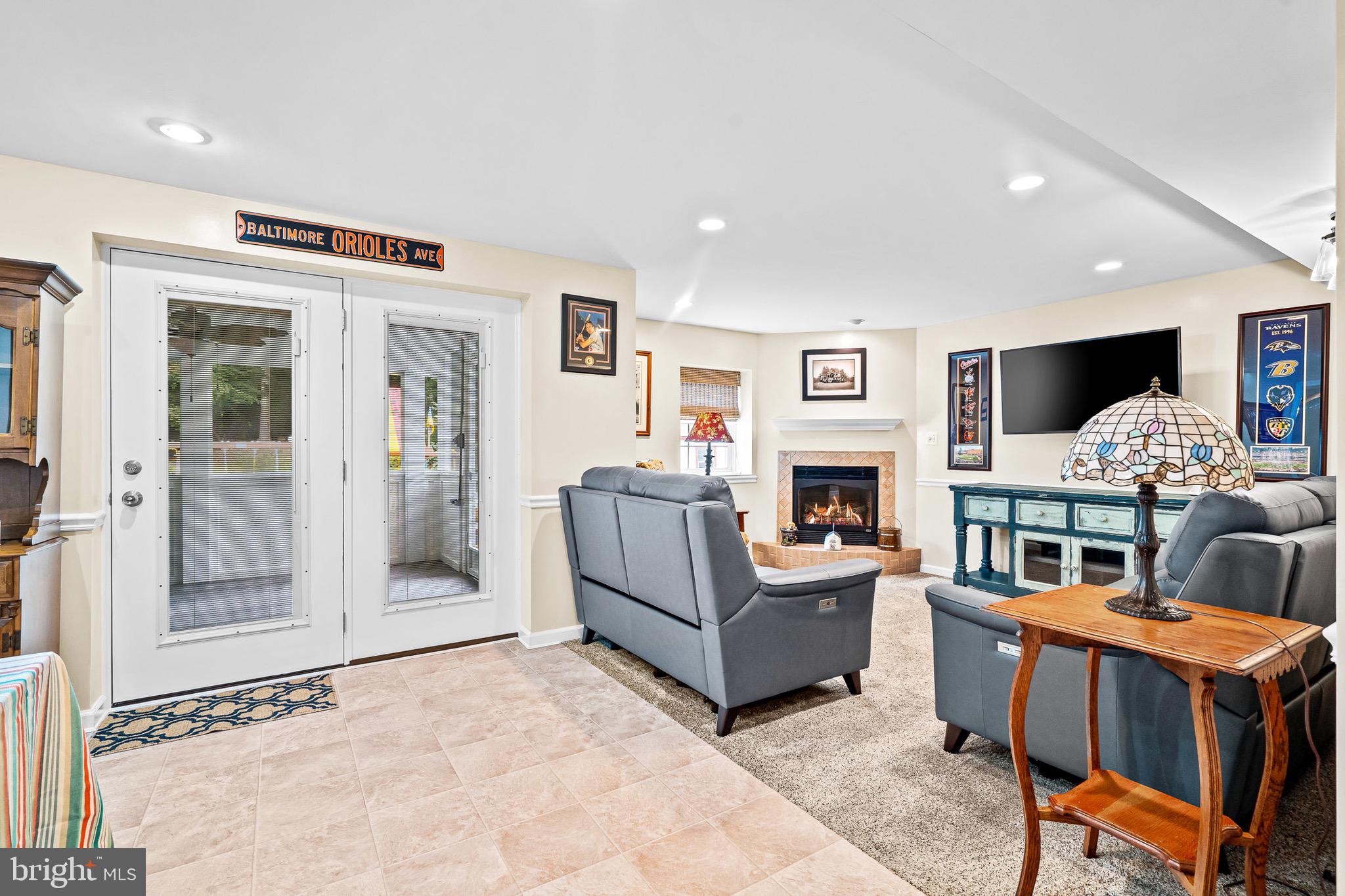 99 Shortcross Road Linthicum Heights, MD 21090 - Photo 26 of 31 Walkout level family room with gas fireplace