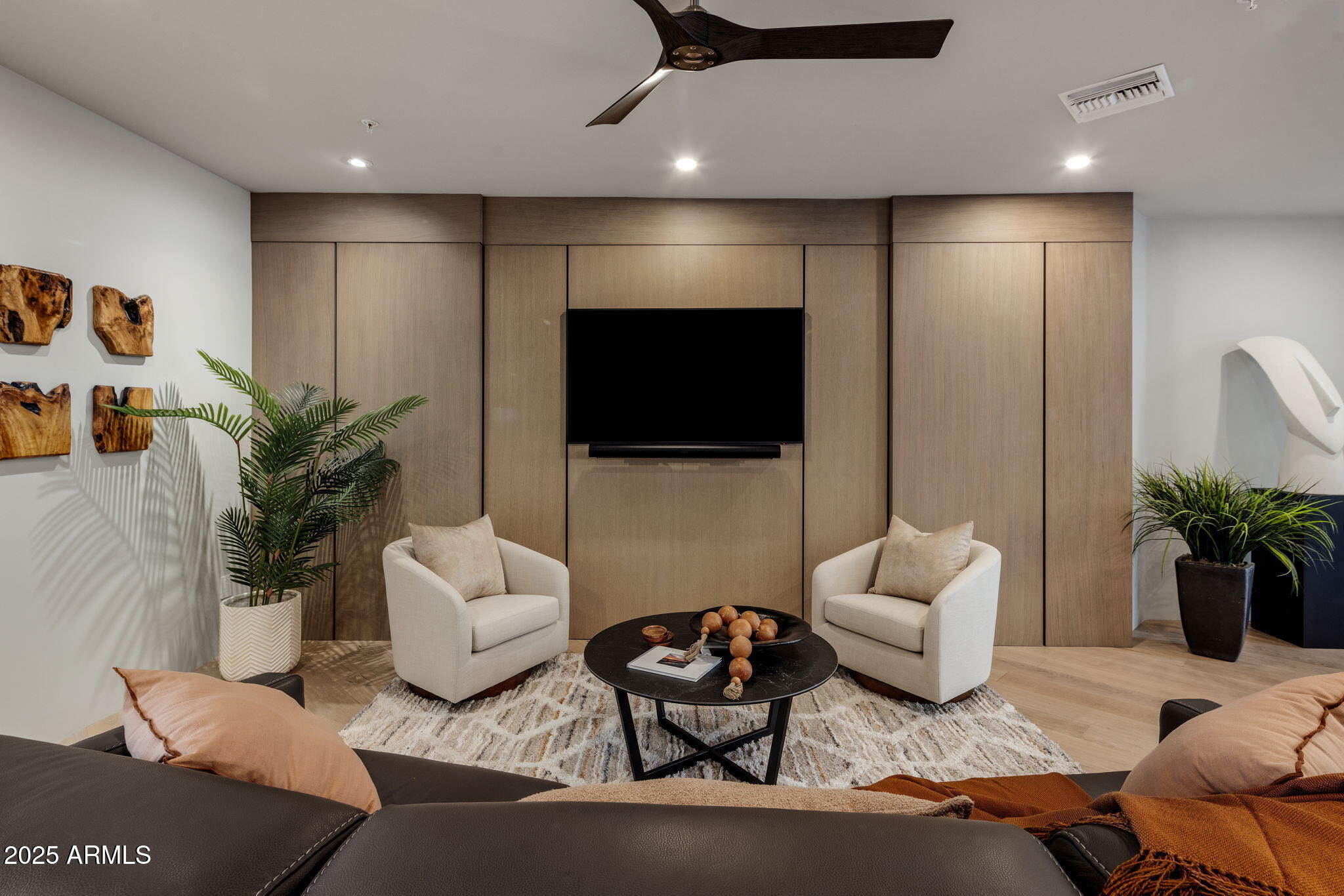 10040 East Happy Valley Road, Unit 1039 Scottsdale, AZ 85255 - Photo 11 of 60 a living room with furniture and a flat screen tv