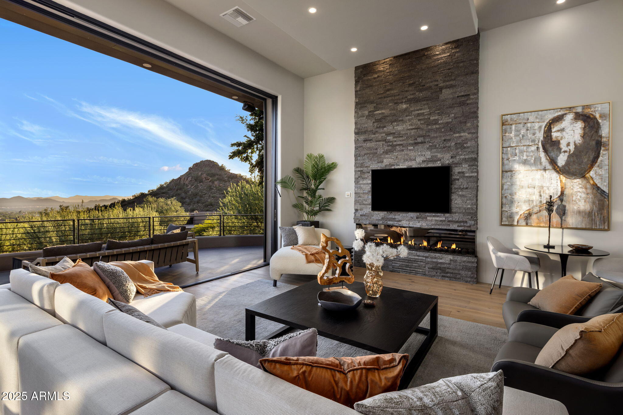 10040 East Happy Valley Road, Unit 1039 Scottsdale, AZ 85255 - Photo 2 of 60 a outdoor living room with furniture and a flat screen tv