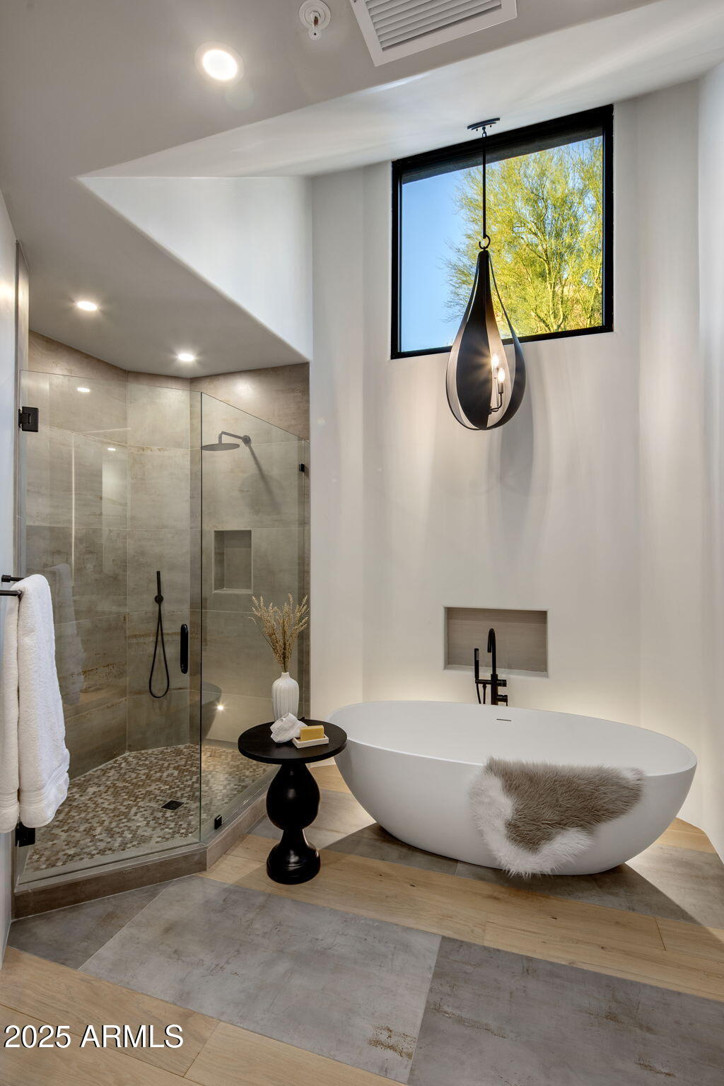 10040 East Happy Valley Road, Unit 1039 Scottsdale, AZ 85255 - Photo 30 of 60 a bathroom with a tub and a shower