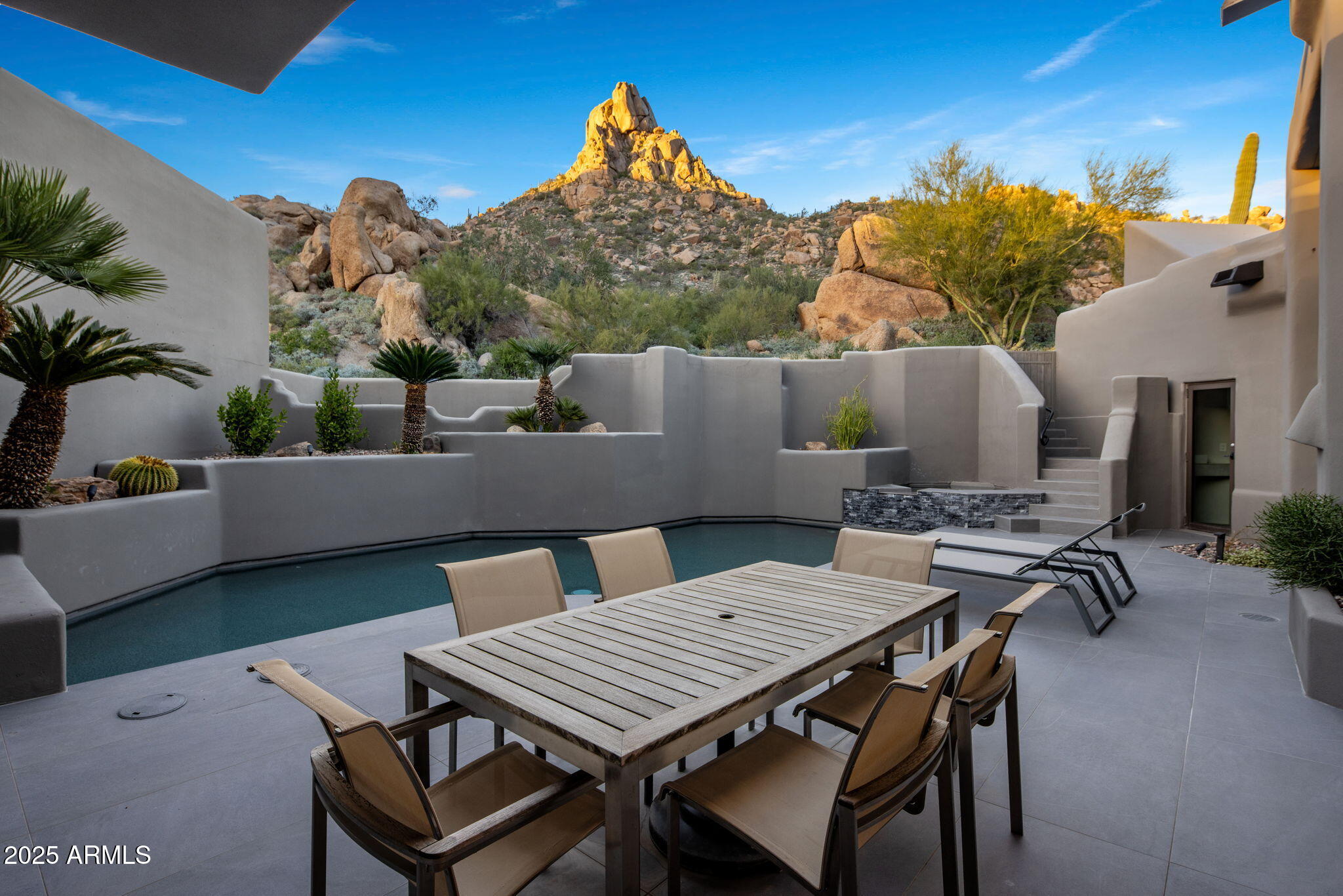 10040 East Happy Valley Road, Unit 1039 Scottsdale, AZ 85255 - Photo 37 of 60 a view of a terrace with furniture and a potted plant