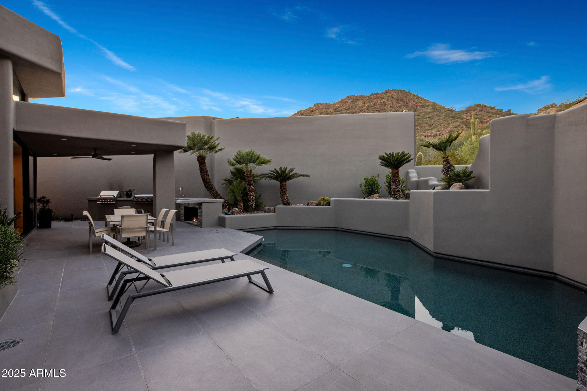 10040 East Happy Valley Road, Unit 1039 Scottsdale, AZ 85255 - Photo 39 of 60 a view of a terrace with sitting area