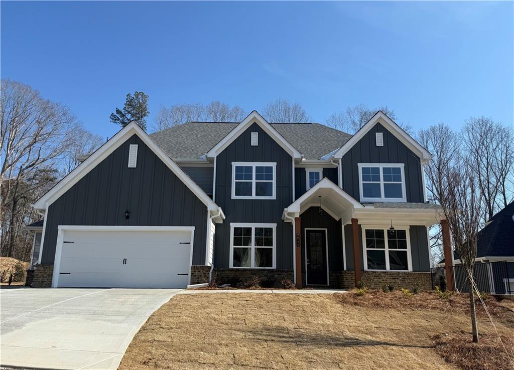2541 Parkside Way Gainesville, GA 30507 - Photo 1 of 45 a front view of a house with a yard