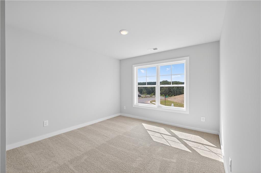 2541 Parkside Way Gainesville, GA 30507 - Photo 29 of 45 a view of an empty room with a window