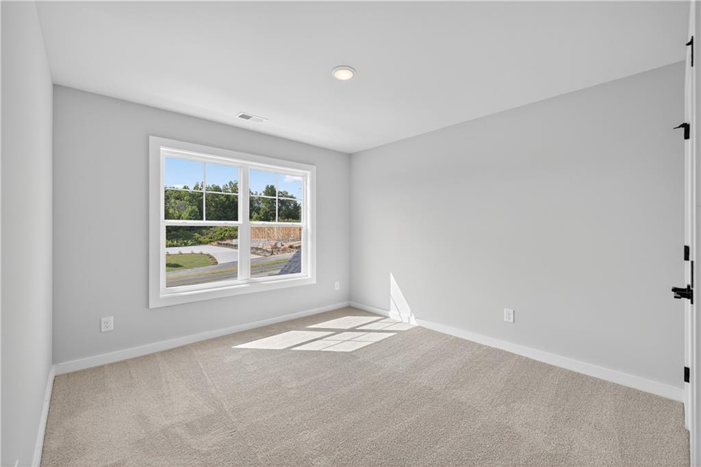 2541 Parkside Way Gainesville, GA 30507 - Photo 31 of 45 a view of an empty room with a window