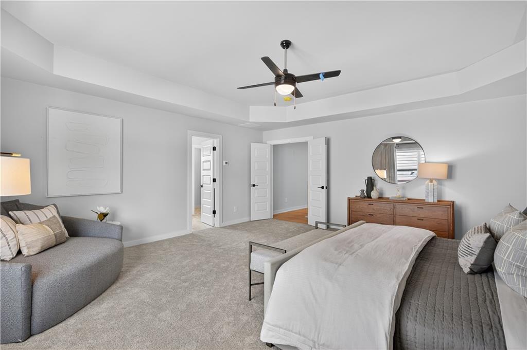 2541 Parkside Way Gainesville, GA 30507 - Photo 36 of 45 a bedroom with a bed and ceiling fan