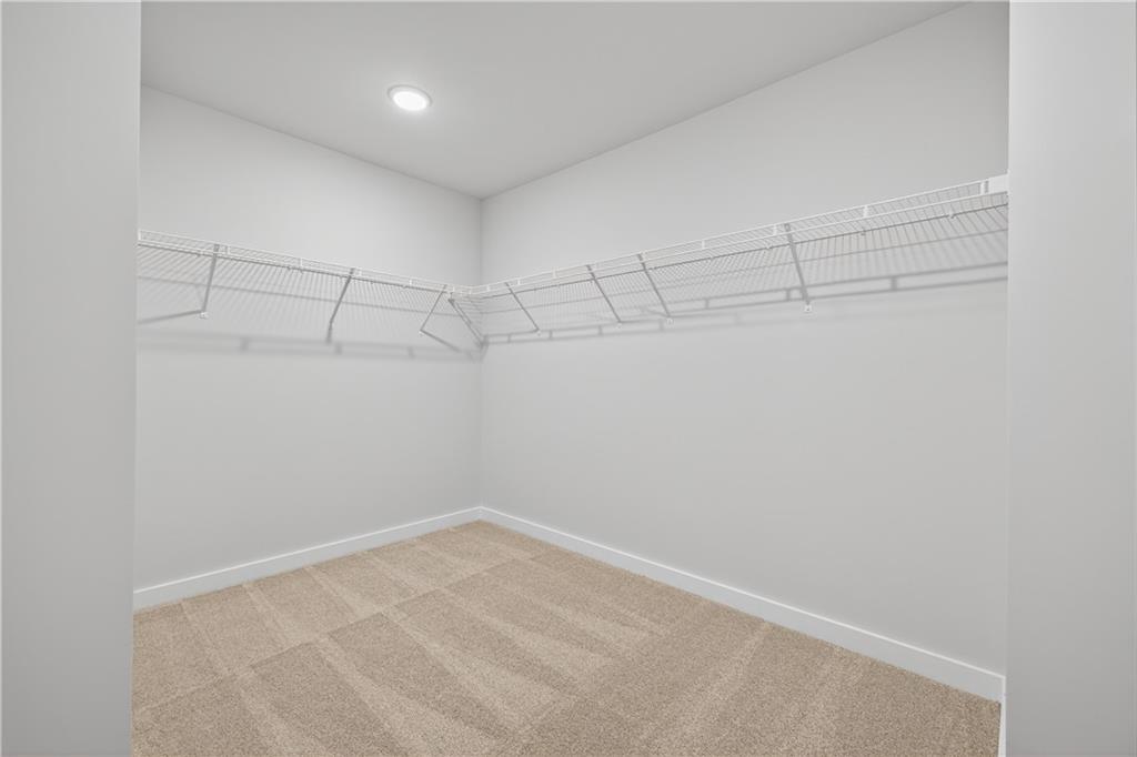 2541 Parkside Way Gainesville, GA 30507 - Photo 42 of 45 a view of a room with racks on the wall