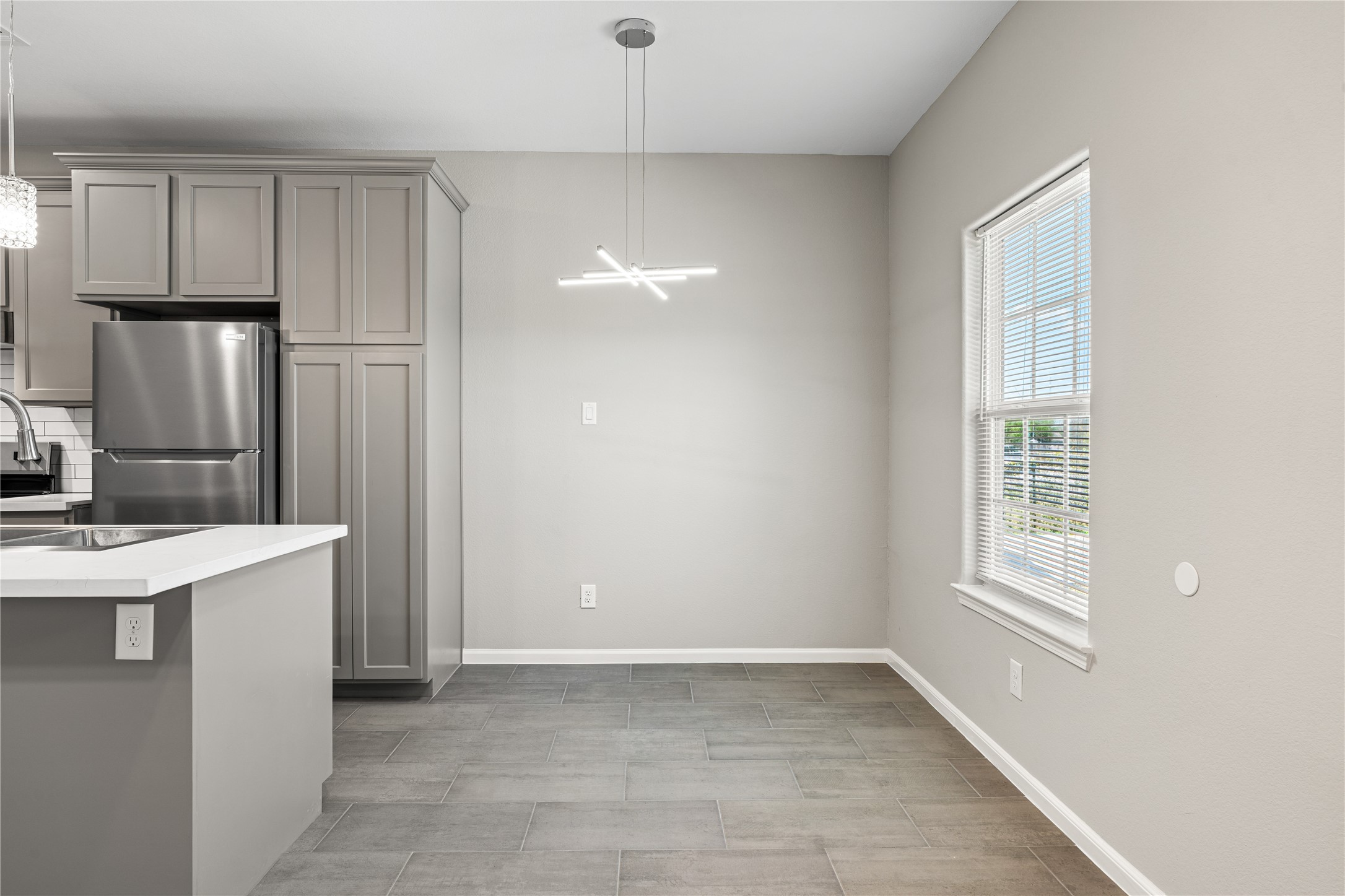 142 Calloway Street, Unit A Houston, TX 77029 - Photo 12 of 23 a view of a kitchen with a sink and dishwasher refrigerator