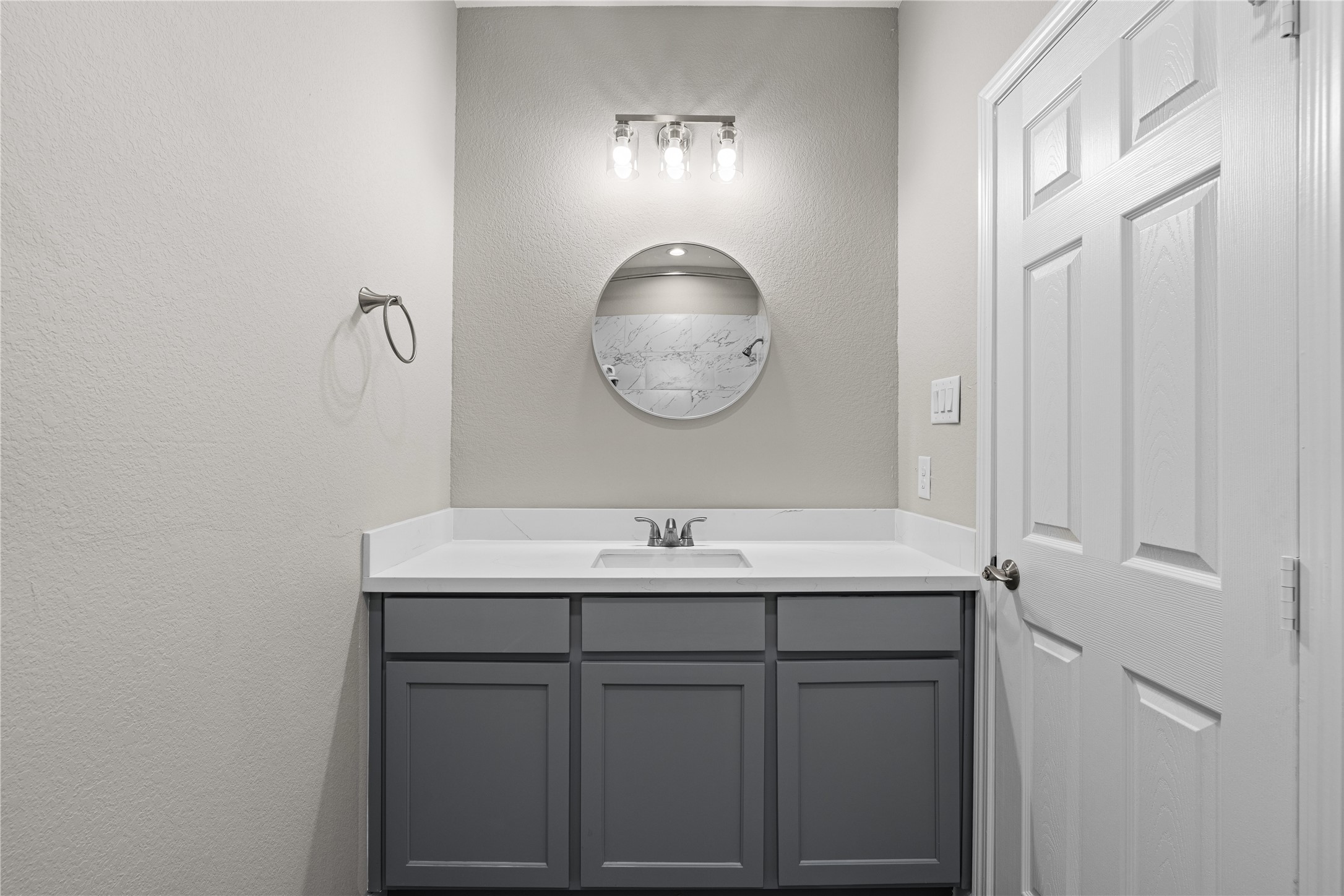 142 Calloway Street, Unit A Houston, TX 77029 - Photo 17 of 23 a bathroom with a sink and a mirror