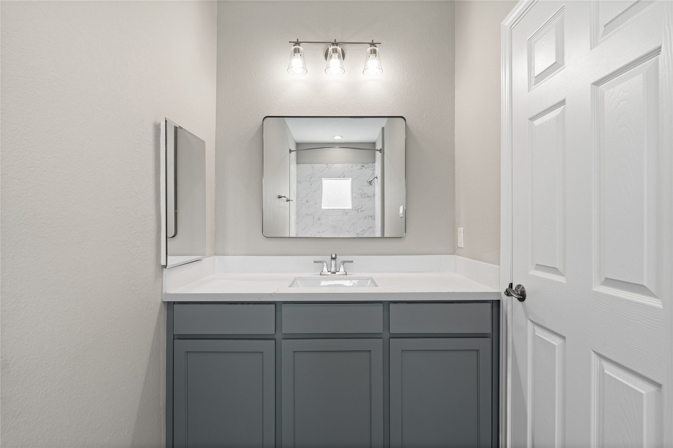 142 Calloway Street, Unit A Houston, TX 77029 - Photo 20 of 23 a bathroom with a sink and a mirror
