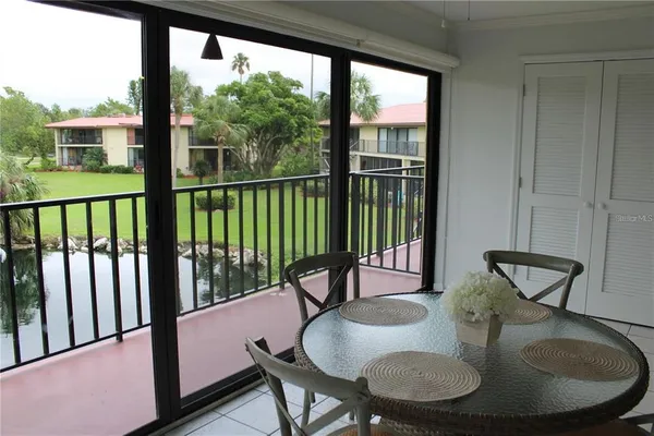 a view of a porch with a yard
