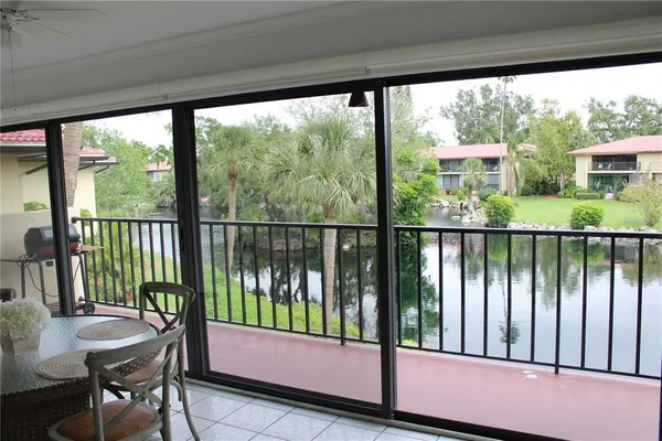 a front view of a house with a lake view