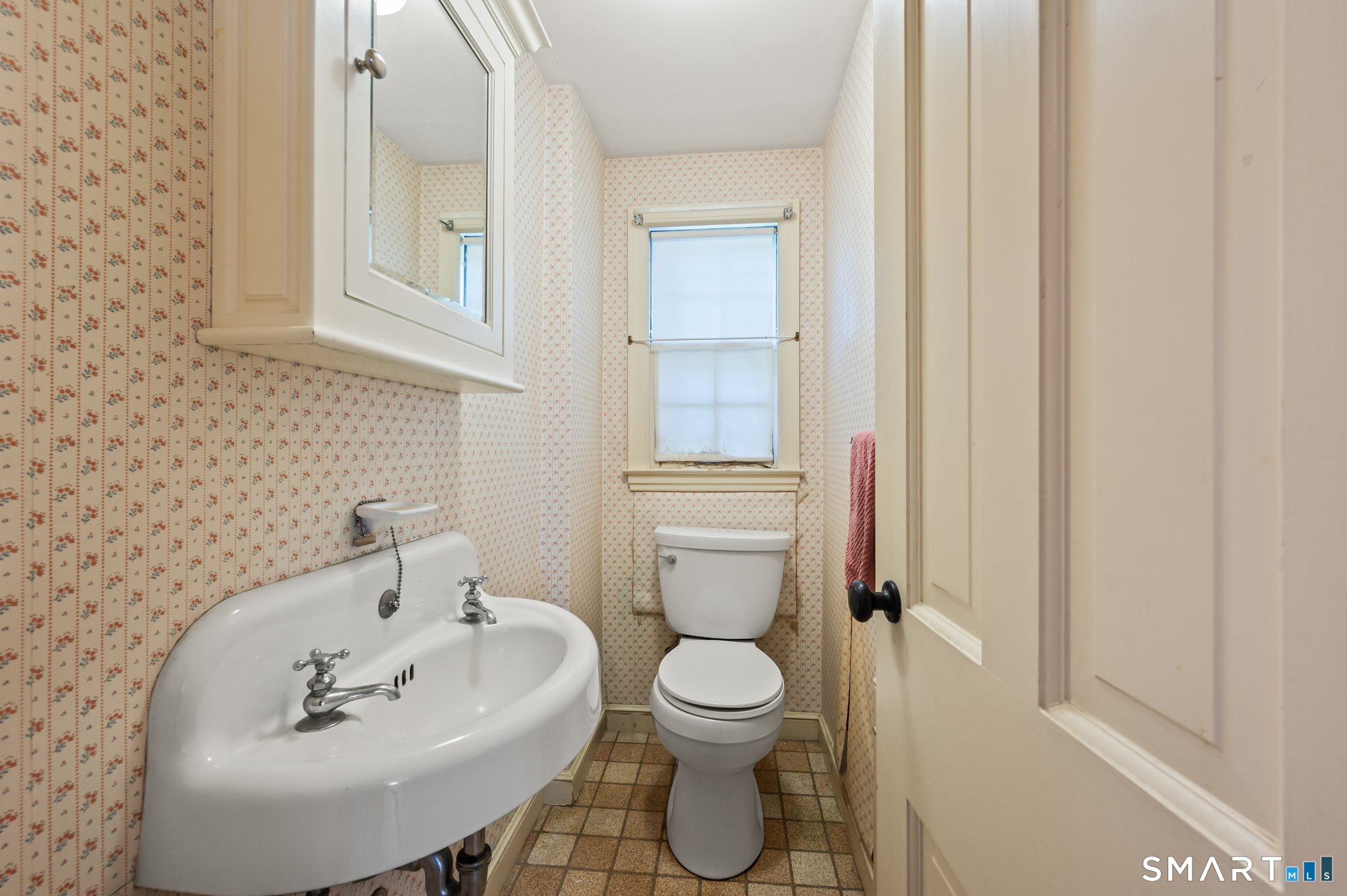 12 Greenhurst Road West Hartford, CT 06107 - Photo 14 of 36 Half bath on main level