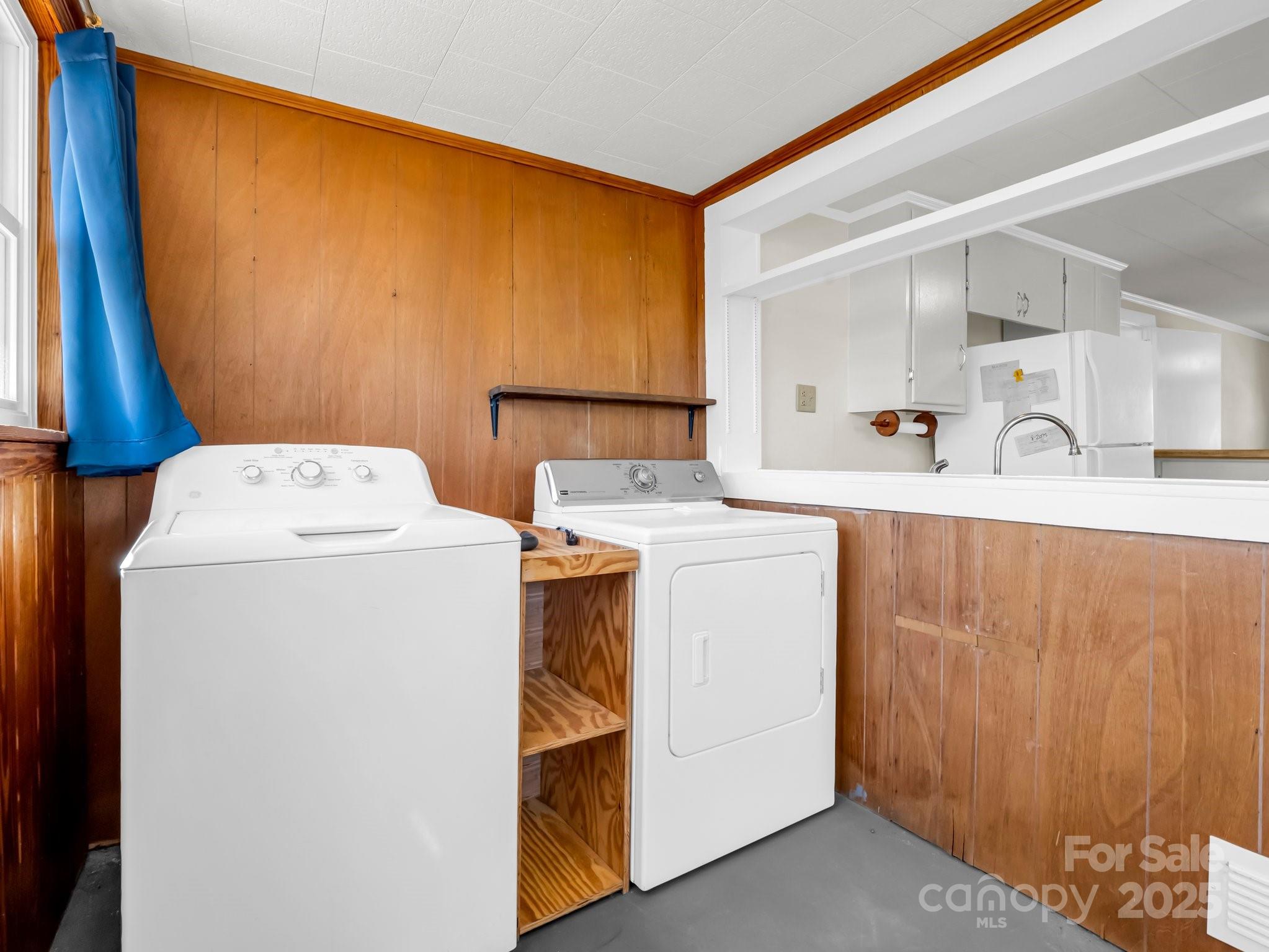 34 Manus Chapel Road Mill Spring, NC 28756 - Photo 21 of 42 a utility room with dryer and washer