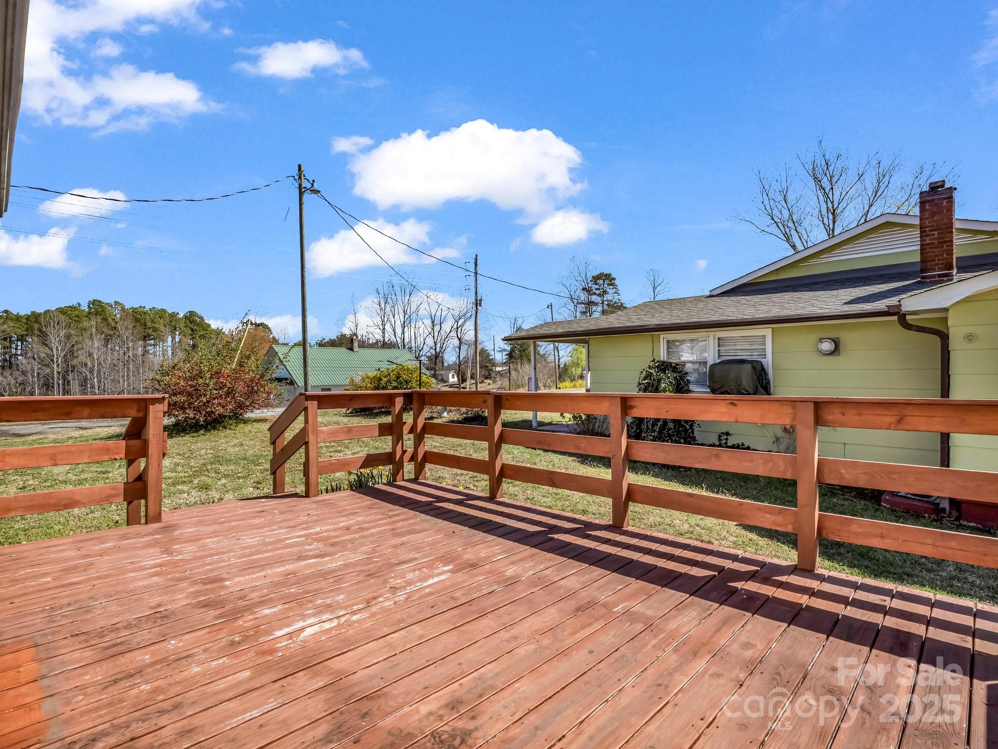 34 Manus Chapel Road Mill Spring, NC 28756 - Photo 22 of 42 a view of street with wooden fence