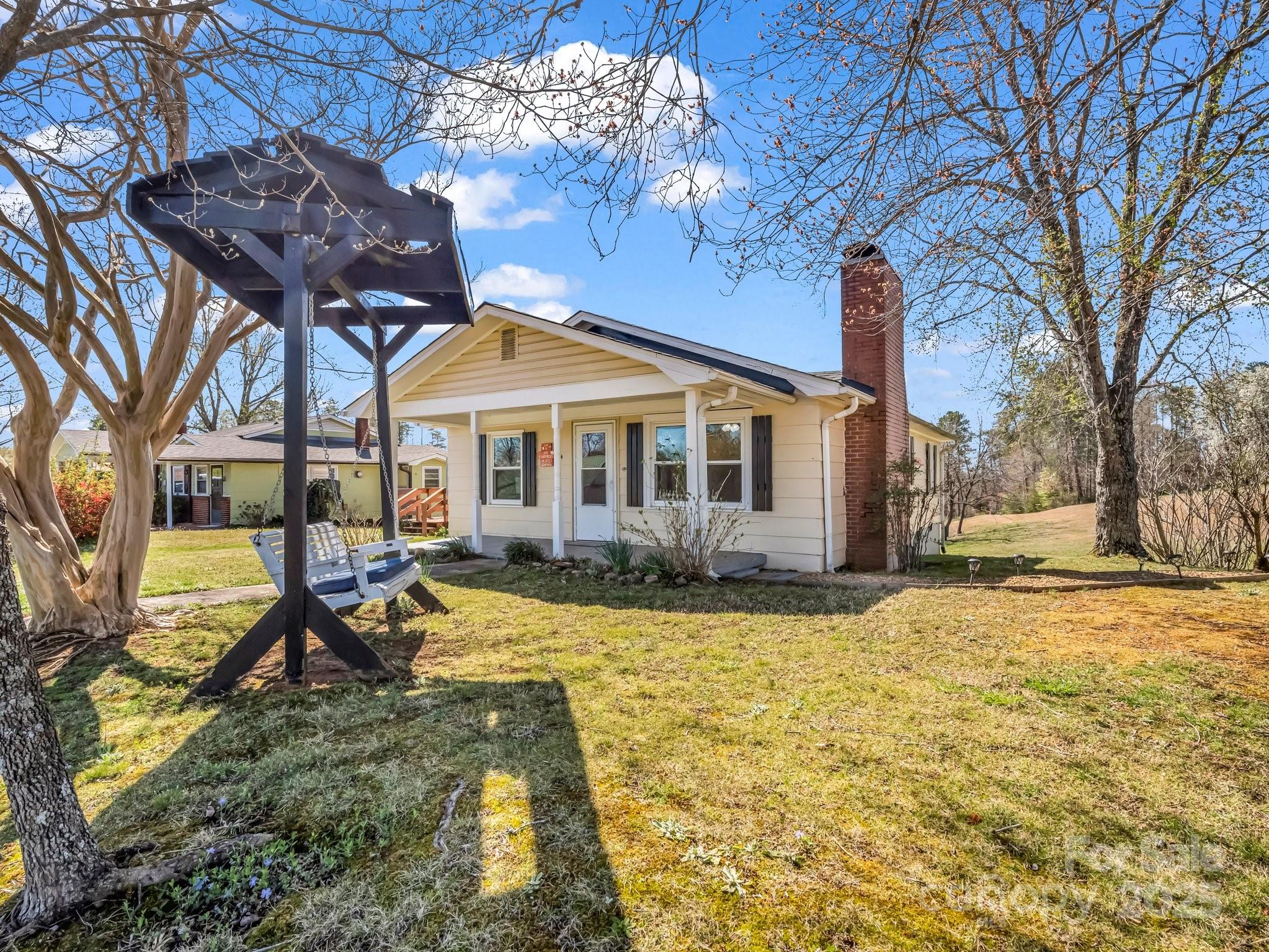 34 Manus Chapel Road Mill Spring, NC 28756 - Photo 3 of 42 a view of a house with swimming pool