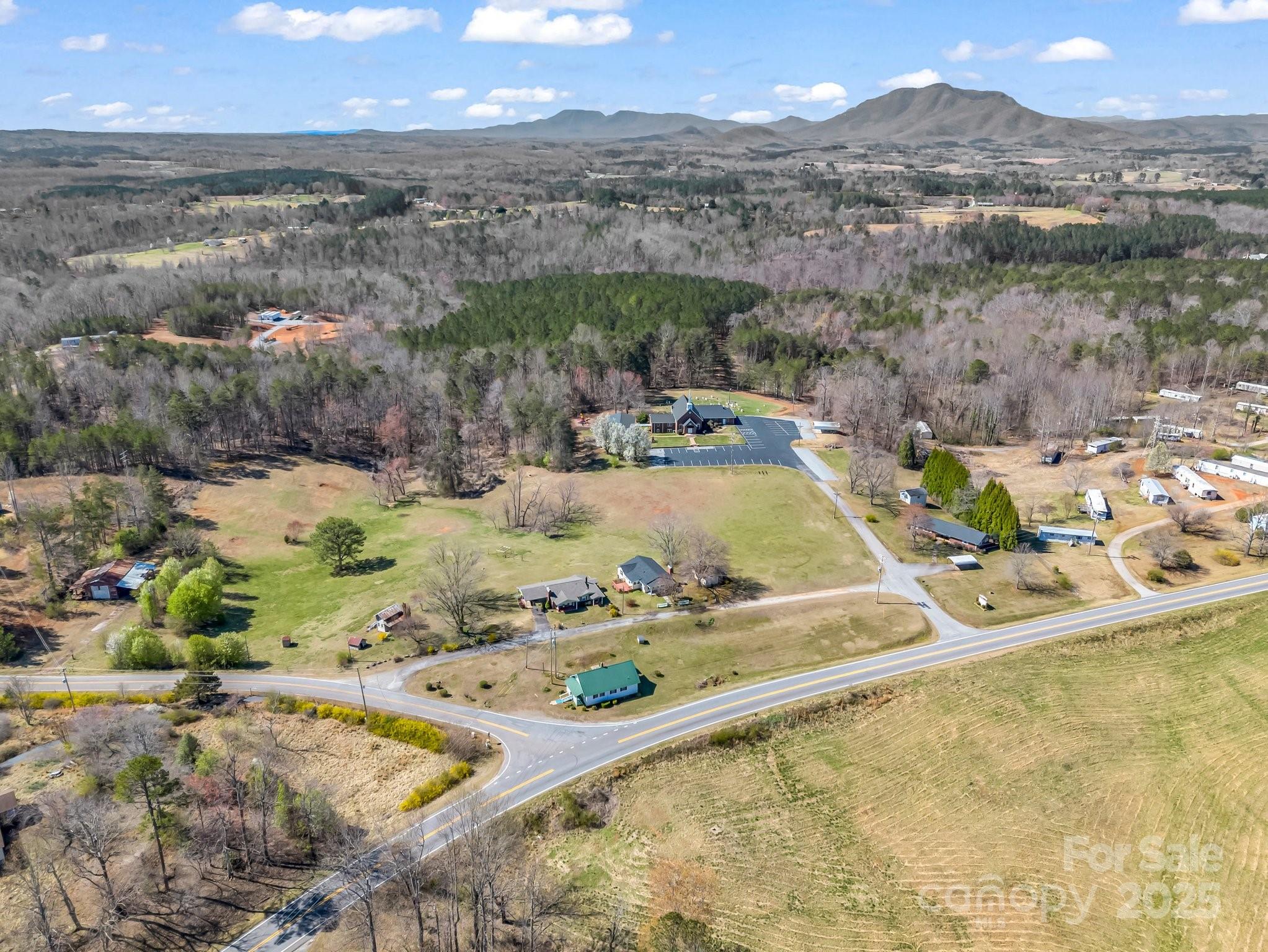 34 Manus Chapel Road Mill Spring, NC 28756 - Photo 36 of 42 a view of a swimming pool with a mountain