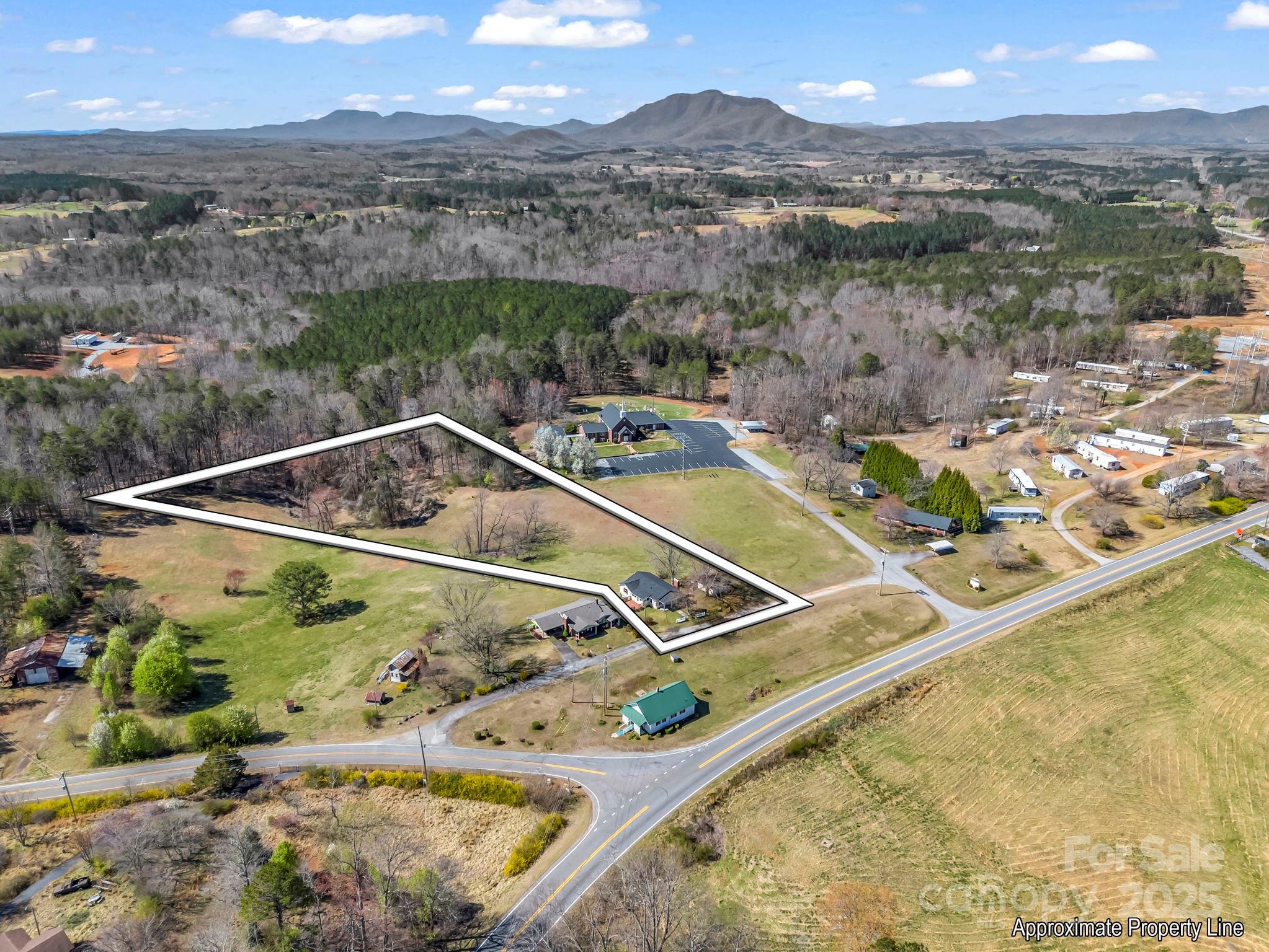 34 Manus Chapel Road Mill Spring, NC 28756 - Photo 38 of 42 a view of a tennis court