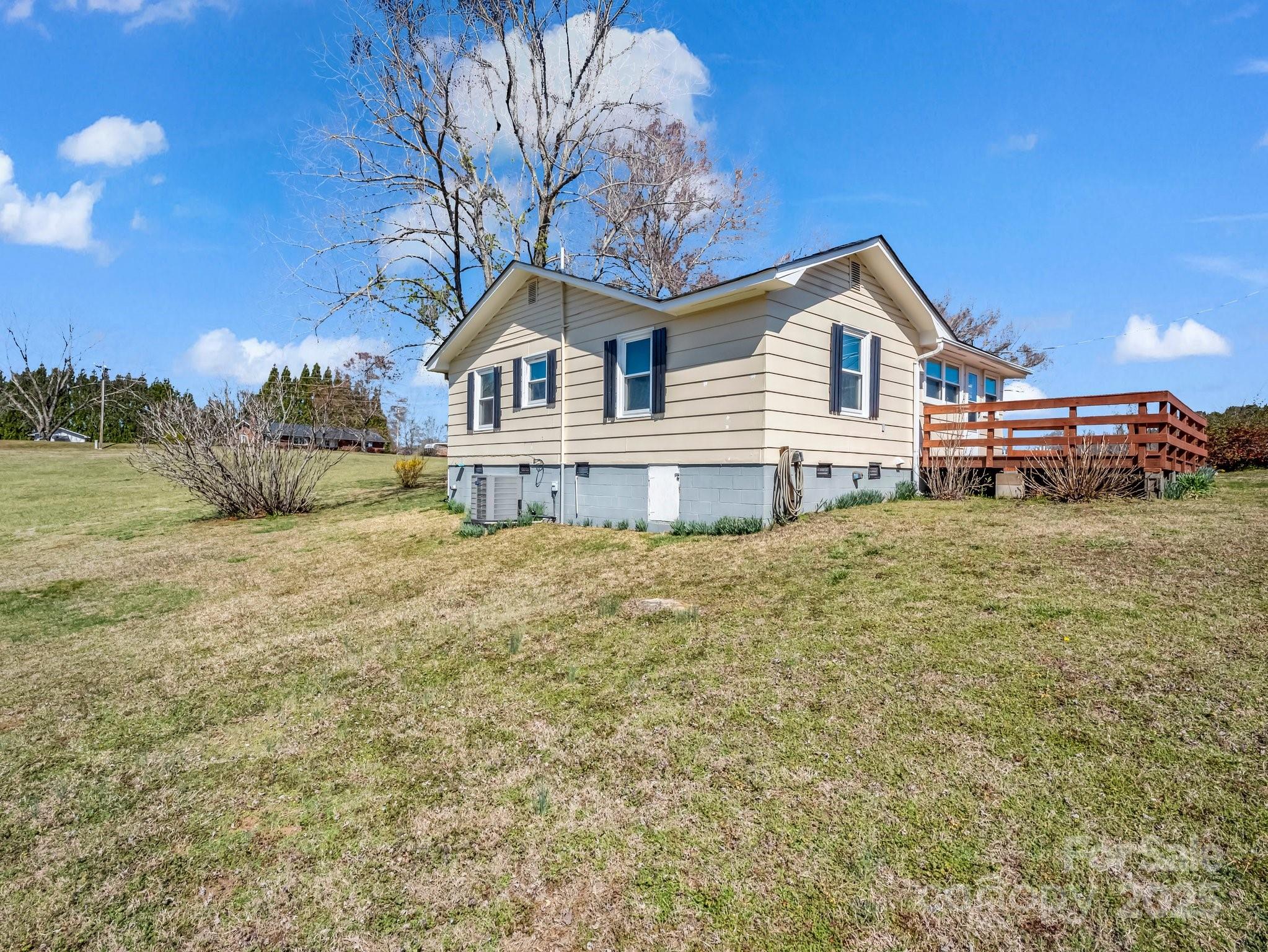 34 Manus Chapel Road Mill Spring, NC 28756 - Photo 5 of 42 a view of a house with a yard